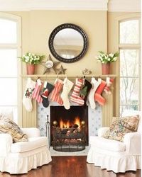 I love the two chairs by the fireplace.